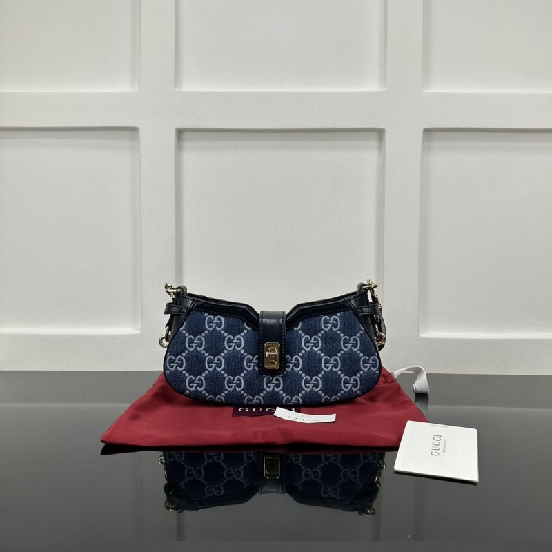G*u*i satchel bags